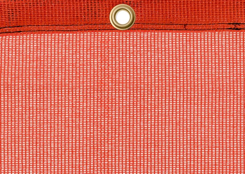 Detail picture of PE air permeable cover, orange, with eyelet and border on top